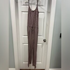 Venus heathered purple with cream polka dotted jumpsuit. Sized M